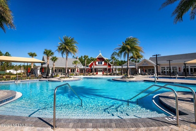 view of pool featuring a patio