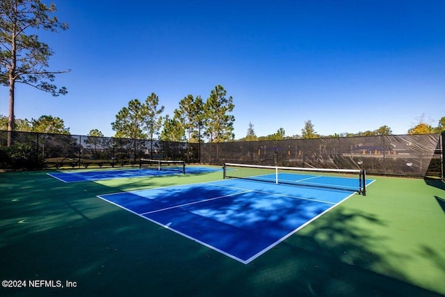 view of tennis court with basketball court