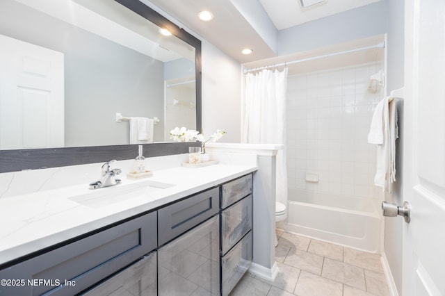 full bathroom with toilet, vanity, tile patterned floors, and shower / tub combo with curtain