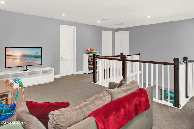 living room featuring dark colored carpet