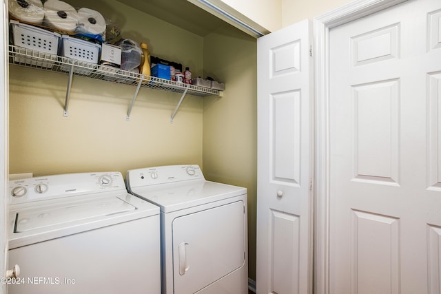 laundry room with washer and dryer