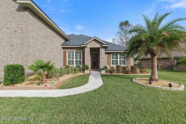 view of front of house with a front lawn