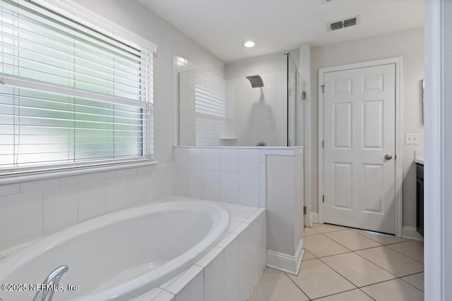 bathroom with separate shower and tub, tile patterned flooring, and vanity