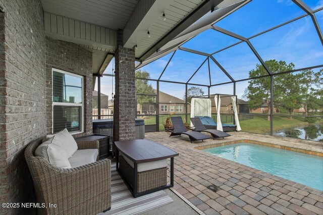 view of patio / terrace with glass enclosure