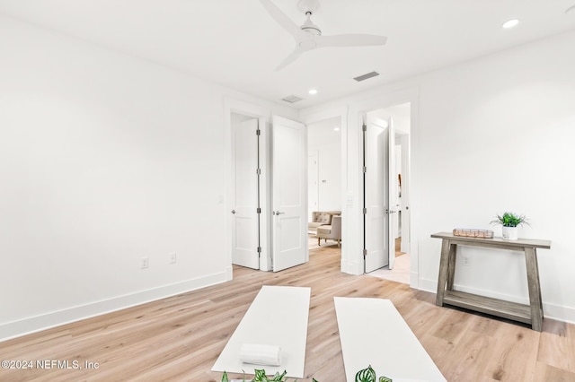 bedroom with ceiling fan and hardwood / wood-style flooring