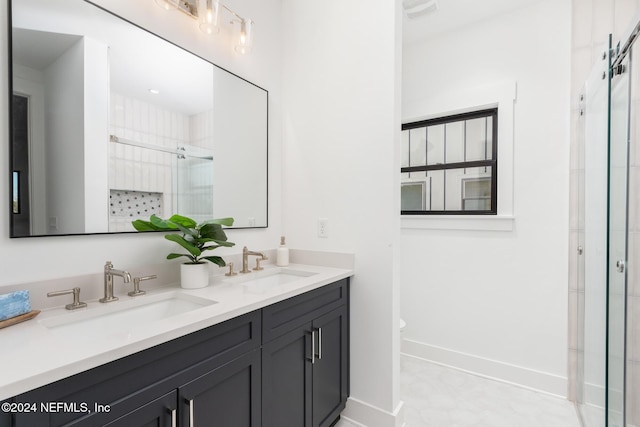 bathroom with vanity, toilet, and walk in shower