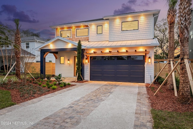 view of front of home with a garage