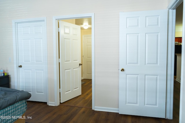 interior space with dark hardwood / wood-style floors