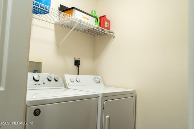 laundry area featuring washing machine and dryer