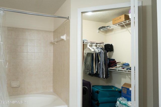 bathroom featuring shower / bathtub combination with curtain