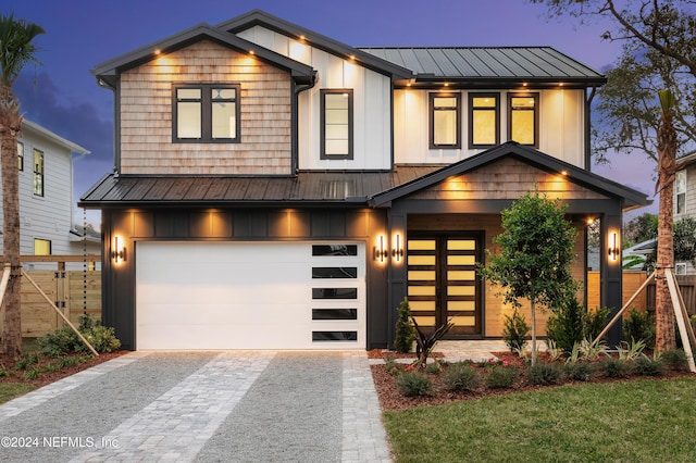 view of front of property featuring a garage