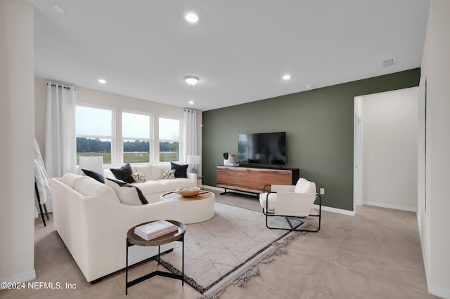 living room featuring light tile patterned floors