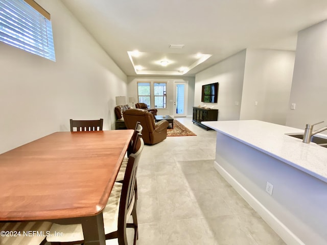 dining area featuring sink