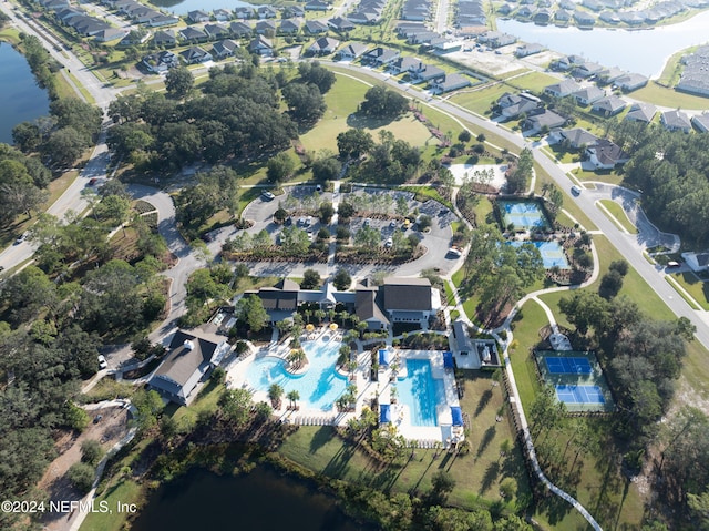 drone / aerial view with a water view