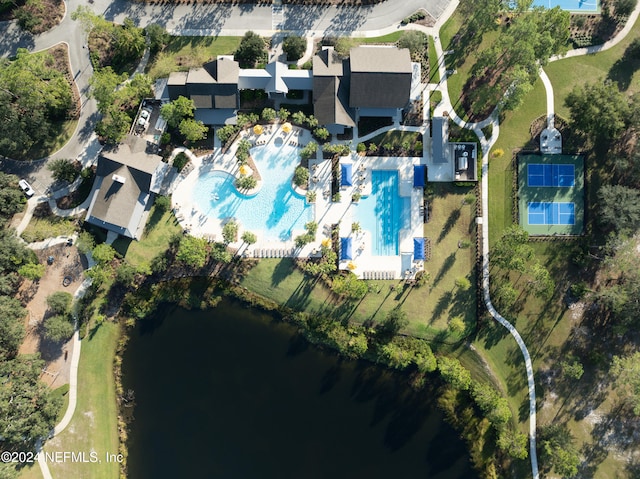 birds eye view of property featuring a water view