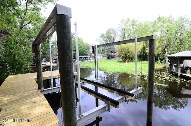 view of dock with a water view