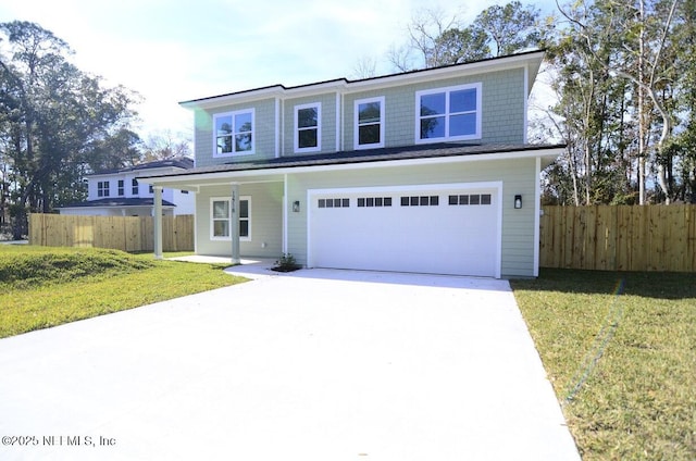 view of front property with a front lawn and a garage