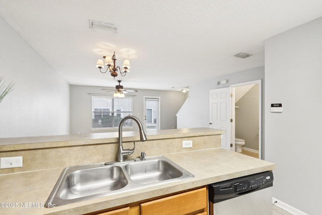 kitchen with dishwasher, sink, and ceiling fan with notable chandelier