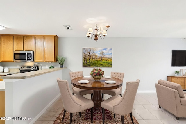 dining room with a chandelier