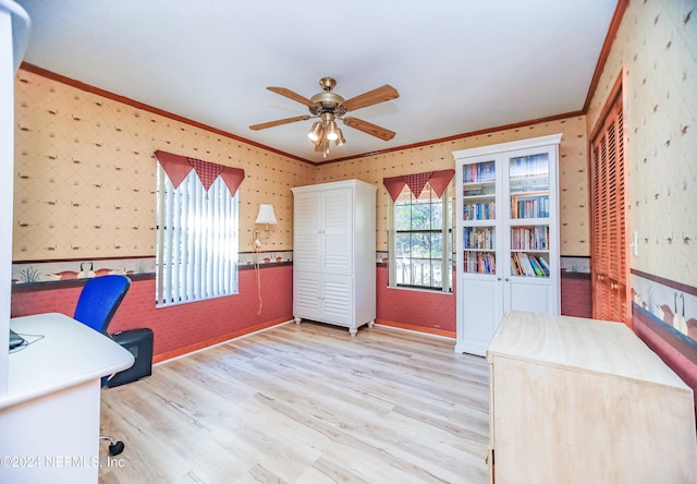 office featuring ceiling fan, light hardwood / wood-style flooring, and ornamental molding