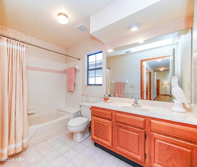 full bathroom featuring tile patterned floors, vanity, shower / bath combination with curtain, and toilet