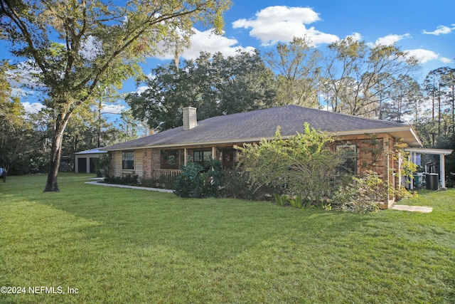 exterior space featuring a front lawn