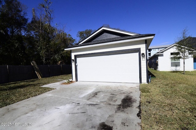 garage with a yard