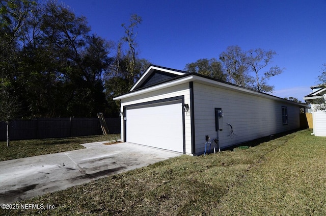 garage with a lawn