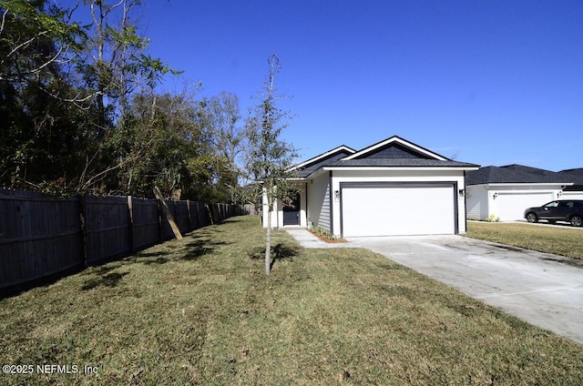 ranch-style house with a front lawn and a garage