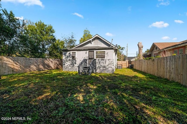 view of outbuilding featuring a lawn