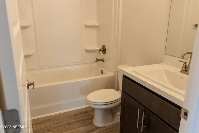 8159 Elsdon St, Jacksonville, FL 32219 - full bath featuring shower / bath combination, vanity, toilet, and wood finished floors