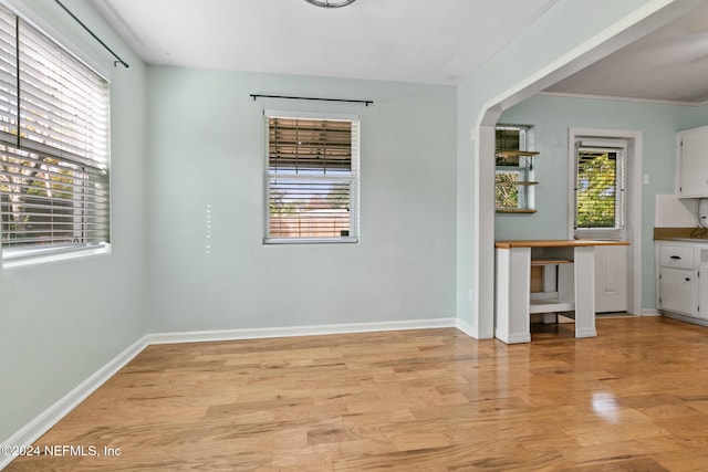 spare room featuring light wood-type flooring