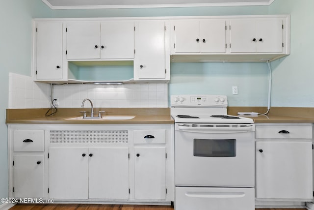 kitchen with backsplash, white cabinetry, ornamental molding, and electric stove