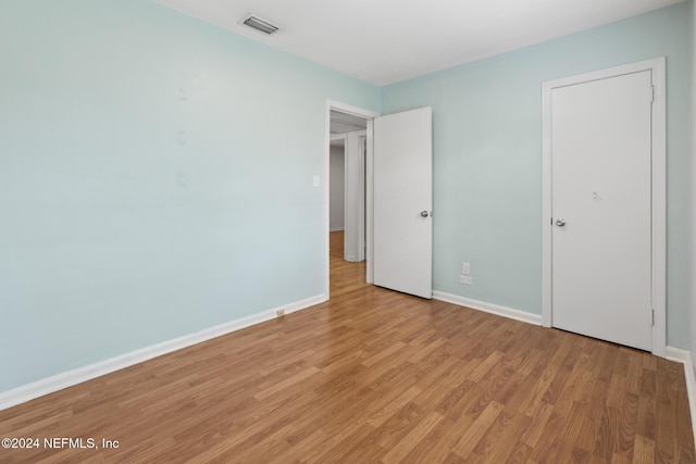 unfurnished bedroom featuring light hardwood / wood-style floors