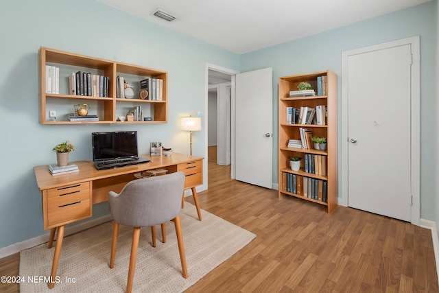 office space featuring light wood-type flooring