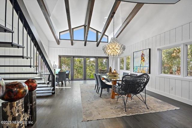 sunroom / solarium with a notable chandelier and vaulted ceiling with beams