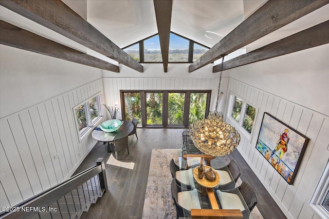 living room featuring beamed ceiling, dark wood-type flooring, and high vaulted ceiling