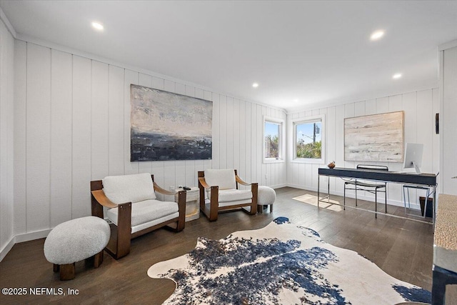 living area with dark hardwood / wood-style flooring