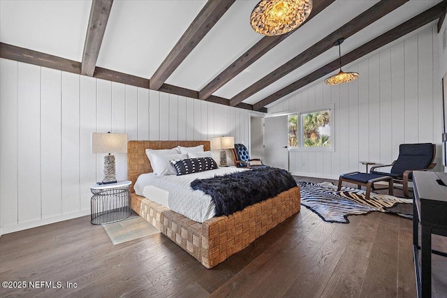 bedroom with lofted ceiling with beams and dark wood-type flooring