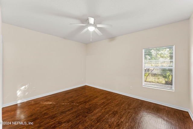 unfurnished room with hardwood / wood-style floors and ceiling fan