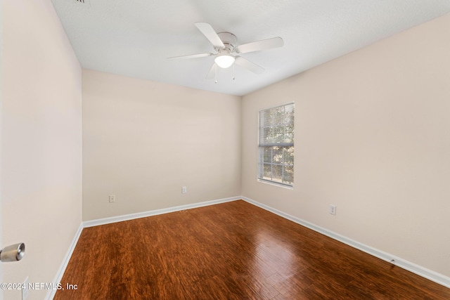 unfurnished room with ceiling fan and hardwood / wood-style floors