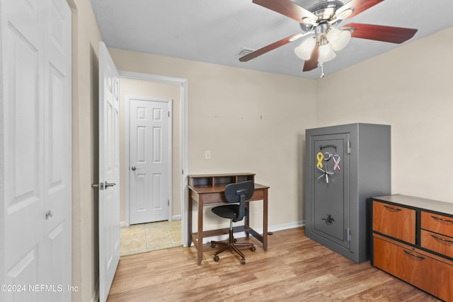 office space featuring ceiling fan and light hardwood / wood-style floors