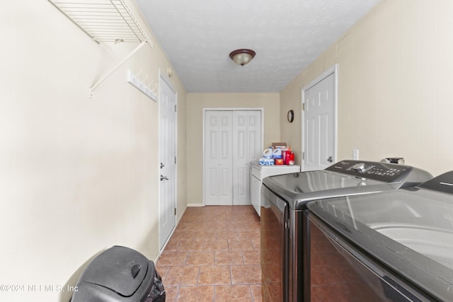 laundry area featuring washer and clothes dryer