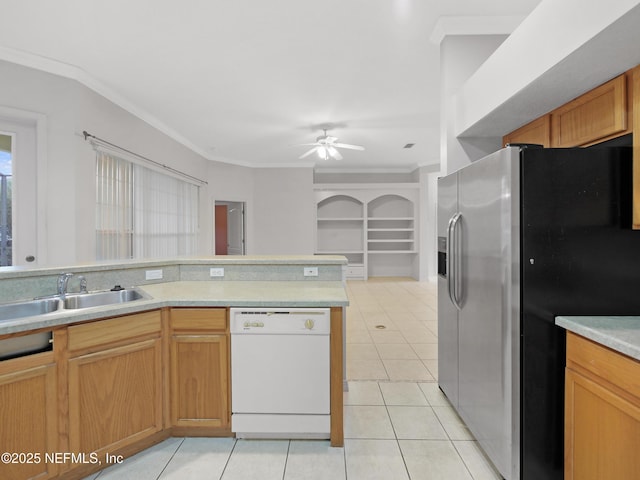 kitchen with stainless steel refrigerator with ice dispenser, ornamental molding, dishwasher, and sink