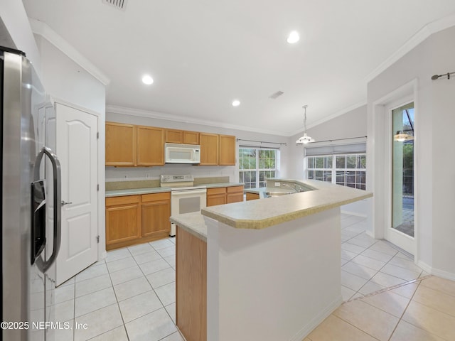 kitchen with pendant lighting, white appliances, ornamental molding, and a kitchen island with sink