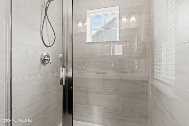 bathroom with an enclosed shower