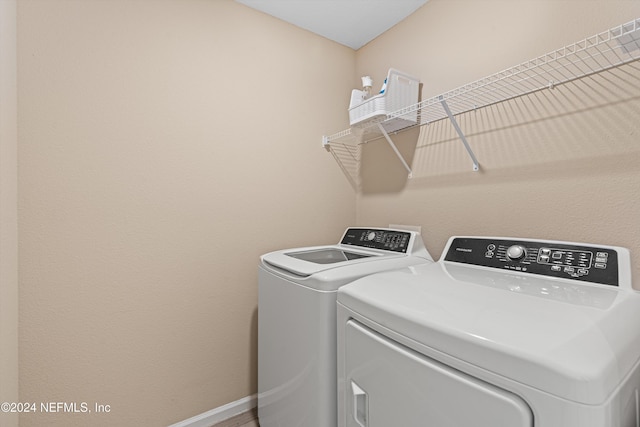 laundry area featuring washing machine and dryer