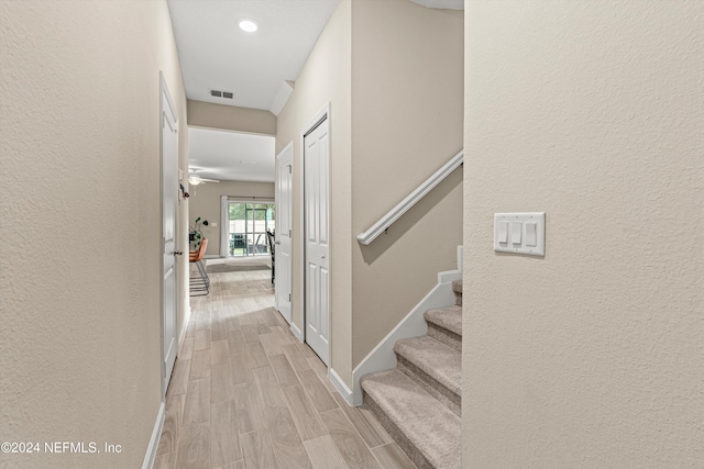 hall with light hardwood / wood-style floors