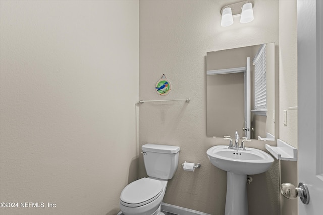 bathroom featuring toilet