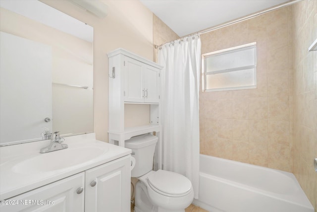 full bathroom featuring shower / bath combination with curtain, vanity, and toilet